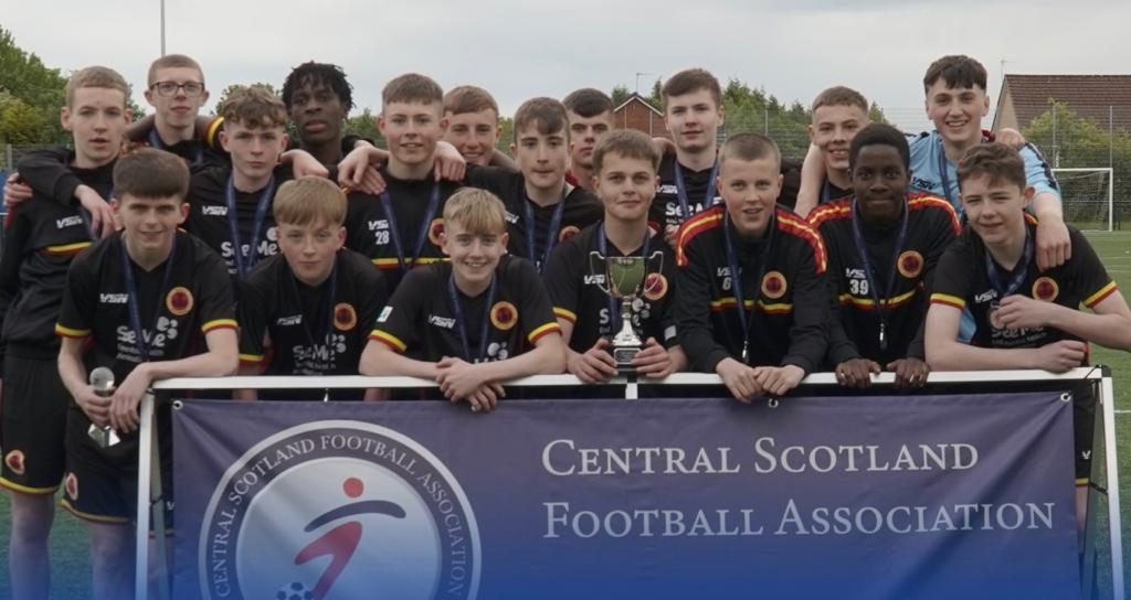 Rossvale team lifting a trophy
